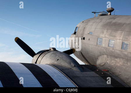A World War Two Dakota transport aircraft in D-Day invasion markings at Shoreham airfield in 2011 Stock Photo
