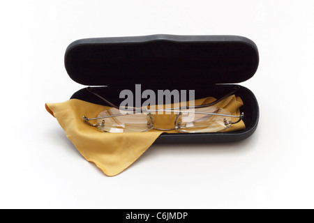 Reading glasses in case on a white background Stock Photo