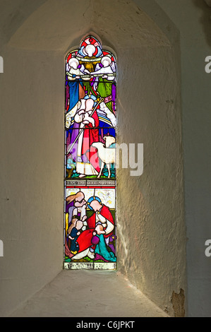 Stained glass window in St Hubert's church in Corfe Mullen Dorset UK Stock Photo