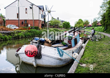 Old former Dutch sailing barge being converted to floating house boat moored in Devizes on the Kennet & Avon canal Stock Photo