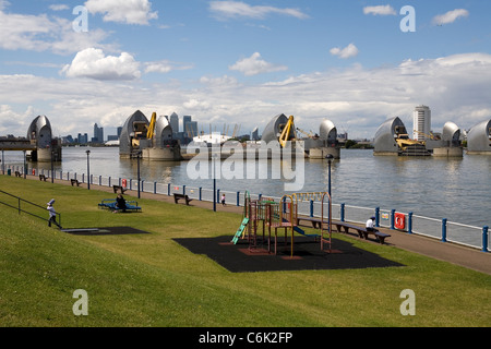 Looking towards the Thames Barrier on the southern banks of the Thames, London. Stock Photo