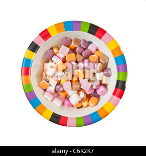 Nice bowl of dolly mixture candy isolated on white Stock Photo