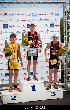 The winners of the Vichy long distance Triathlon. Stephen BAYLISS (First), Teemu LEMMETTYLÄ (Second) and Jamie WHYTE (Third) Stock Photo