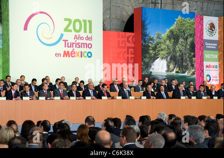 President Calderon (right of center) participating in the Mexico Year of Tourism conference in Mexico City Stock Photo