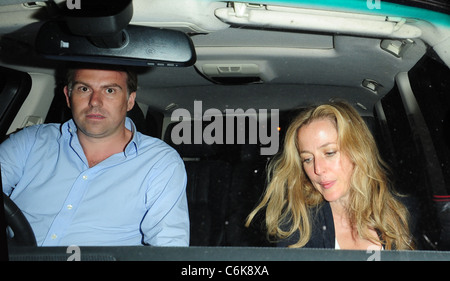 Gillian Anderson and her husband Mark Griffiths seen leaving The Ivy Club in London's West End London, England - 03.08.10 Stock Photo