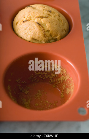 Freshly baked lemon muffin in silicon muffin tin Stock Photo