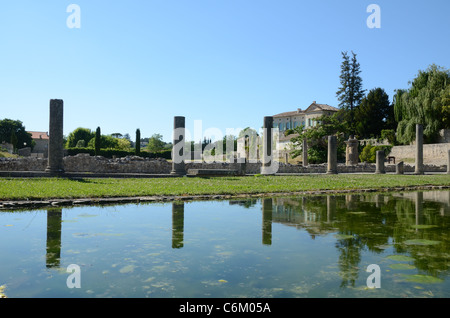 Remains of Courtyard House & Columns Reflected in Pool at the Roman Ruins or City of Vaison-la-Romaine, Vaucluse, Provence, France Stock Photo