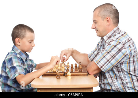 Father and son playing chess, isolated on white background Stock Photo