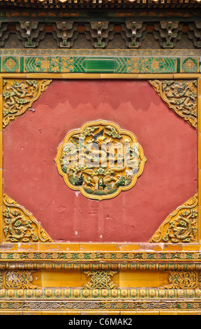 colorful chinese wall ornament in beijings forbidden city Stock Photo