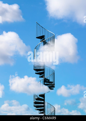 metal spiral staircase rising through bright blue sky with puffy white clouds Stock Photo