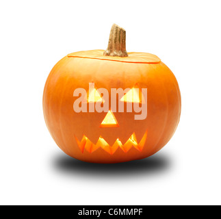 a cutout halloween lit glowing pumpkin turnip lantern isolated on a white background with clipping path