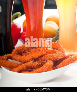 deep fried calamari rings served with selection of black,red and blonde beer ,MORE DELICIOUS FOOD ON PORTFOLIO Stock Photo
