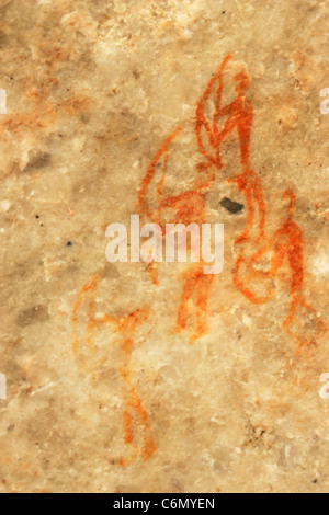 San rock art in cave interior showing  hunters with bows Stock Photo