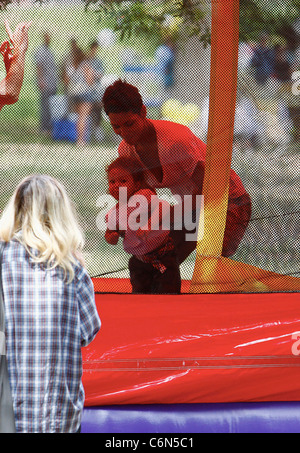 Actress Halle Berry dresses her daughter Nahla in an identical outfit to her own for a day of fun at the park. The X-Men star Stock Photo