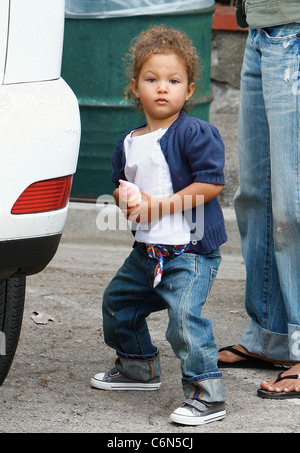 Actress Halle Berry dresses her daughter Nahla in an identical outfit to her own for a day of fun at the park. The X-Men star Stock Photo