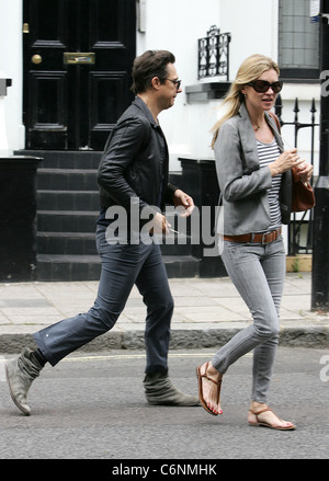 Kate Moss and Jamie Hince spotted after having lunch at a Sushi restaurant in central London. London, England - 06.07.10 : Stock Photo
