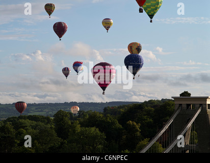 dh Bristol Balloon Fiesta CLIFTON BRISTOL Balloon festival hot air balloons flying above Clifton Suspension bridge uk Stock Photo