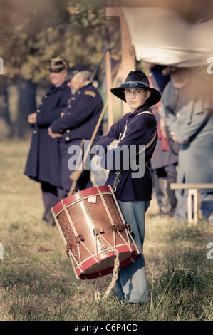 A young Civil War reenactor in costume with snare drum and slouch hat Stock Photo