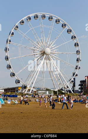 Large ferris wheel beside the beach in Weston Super Mare Stock Photo