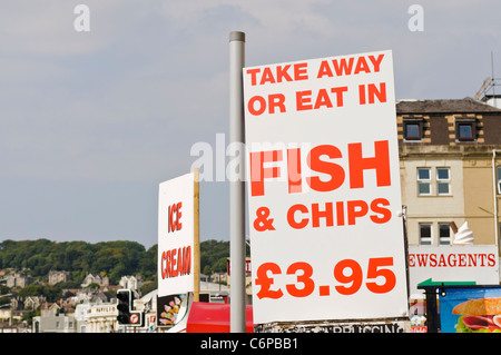 Signs outside an English seaside fish and chip shop Stock Photo