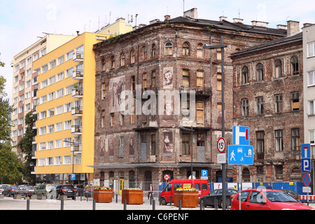 Warsaw Poland the Ulica Ul Prozna street part of the old Jewish Ghetto area with photos of former residents next to modern flats Stock Photo