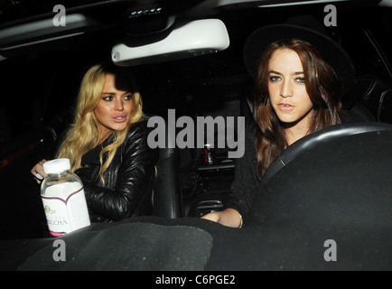 Lindsay Lohan leaving Teddy's nightclub in Hollywood with a friend Los Angeles, California, USA - 21.06.10 Stock Photo