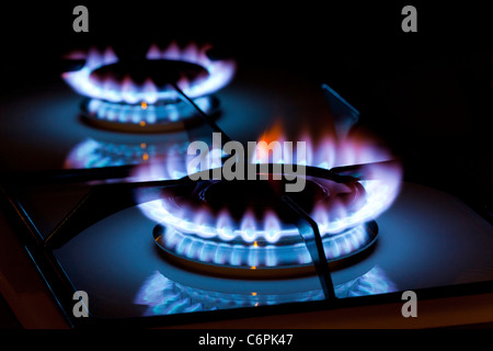 gas flames on a cooker rings Stock Photo