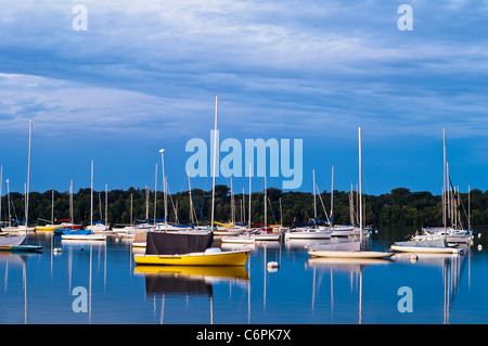 Sailboats moored on Lake Harriet, Minneapolis, Minnesota in pre-dawn light. Stock Photo