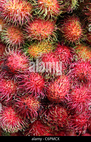 Detail of Rambutan on a fruit stand in Chinatown. Kuala Lumpur, Malaysia, Southeast Asia Stock Photo