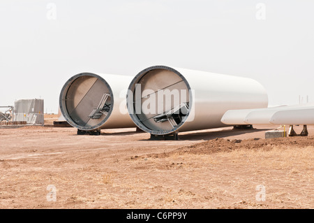 Components for a horizontal-axis wind turbine are being assembled on a construction site near Amarillo, Texas. Stock Photo
