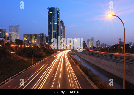 Evening view on Ayalon highway and modern buildings at down town of Tel Aviv, Israel. Stock Photo