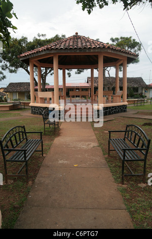 Gazebo at the main central plaza park of a small rural town of the Azuero (Los Santos Herrera) region of Panama, exterior bench. Stock Photo