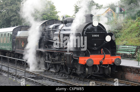 U class locomotive No 31806 at Ropley on the Mid Hants Railway, Hampshire, England, UK Stock Photo