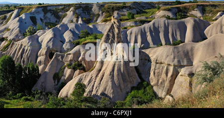 Aerial panoramic view of the surreal tufa landscape of Goreme at sunrise, Nevsehir, Cappadocia, Central Anatolia, Turkey Stock Photo