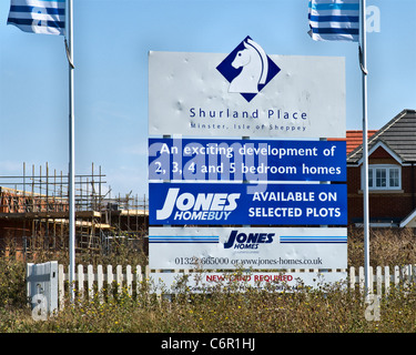 Builder Jones Homes sign, damaged by vandals with an air gun and throwing stones. Shurland Place, Minster on Sea, Sheppey, Kent Stock Photo