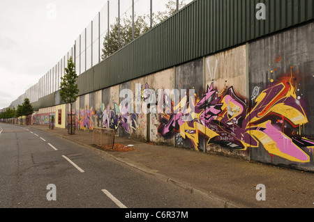 Part of one of the Belfast 'Peace Walls' Stock Photo