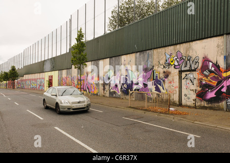 Part of one of the Belfast 'Peace Walls' Stock Photo