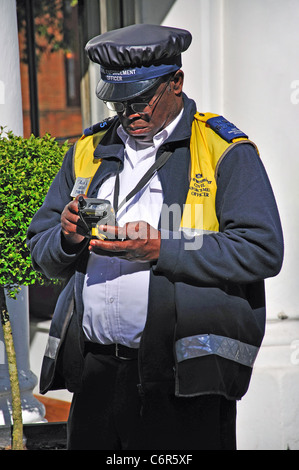 Traffic warden, St.John's Wood High Street, St.John's Wood, City of Westminster, London, Greater London, England, United Kingdom Stock Photo