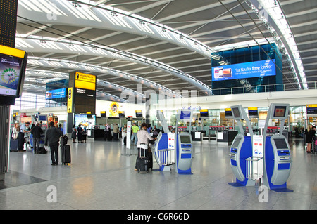 Departure level interior, Terminal 5, Heathrow Airport. London Borough of Hounslow, Greater London, England, United Kingdom Stock Photo