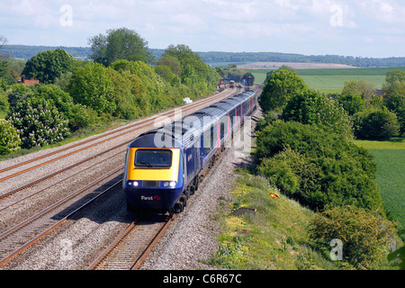A first great western HST speeds through Cholsey on the GWML with 17.22 Paddington to Hereford on 09-05-11 Stock Photo