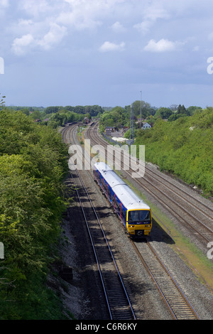 First Great Western 165104 heads through Cholsey with an Oxford - London service on 9-5-11. Stock Photo