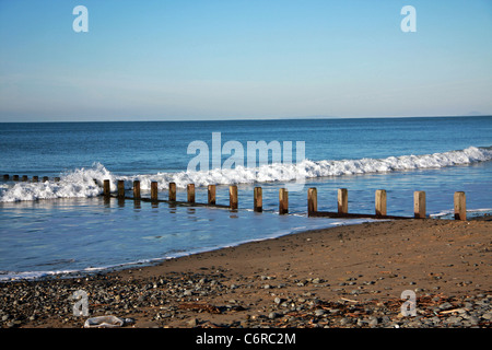 Waves breaking on the beach at Borth, Near Aberystwyth Stock Photo