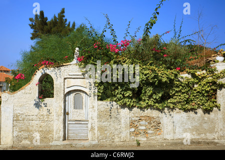 Fancy wicket with mailbox in the wall somewhere in Reggio Calabria, southern Italy Stock Photo