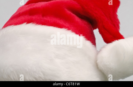 Hat of the Santa Claus, Christmas red cap with a pompon Stock Photo
