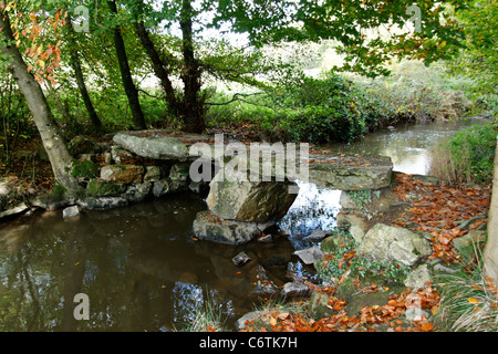 Megalithic bridge, river la Varenne, Le Chatellier (Orne, Normandy, France). Stock Photo