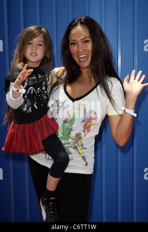 Tia Carrere and her daughter Bianca The SK8 4 Life event benefiting the Rob Dyrdek Foundation held at The Fantasy Factory Los Stock Photo