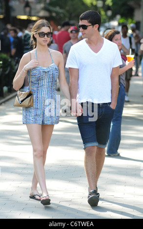 Whitney Port in flip flops and a short blue and white dress, out and about on a hot day with and Ben Nemtin in Manhattan New Stock Photo