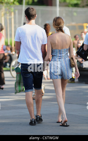 Whitney Port in flip flops and a short blue and white dress, out and about on a hot day with and Ben Nemtin in Manhattan New Stock Photo