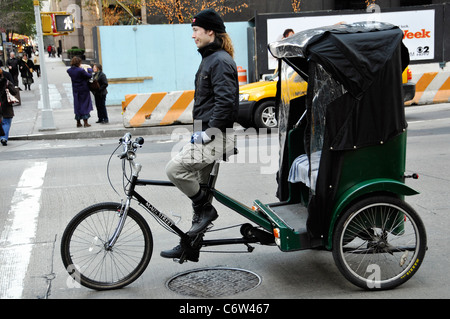 Tricycle taxi- pedicab in New York City, Manhattan Stock Photo