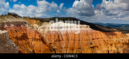 Panorama of red cliff formations in Cedar Breaks National Monument in Utah, at greater than 10,000 feet in altitude. Stock Photo